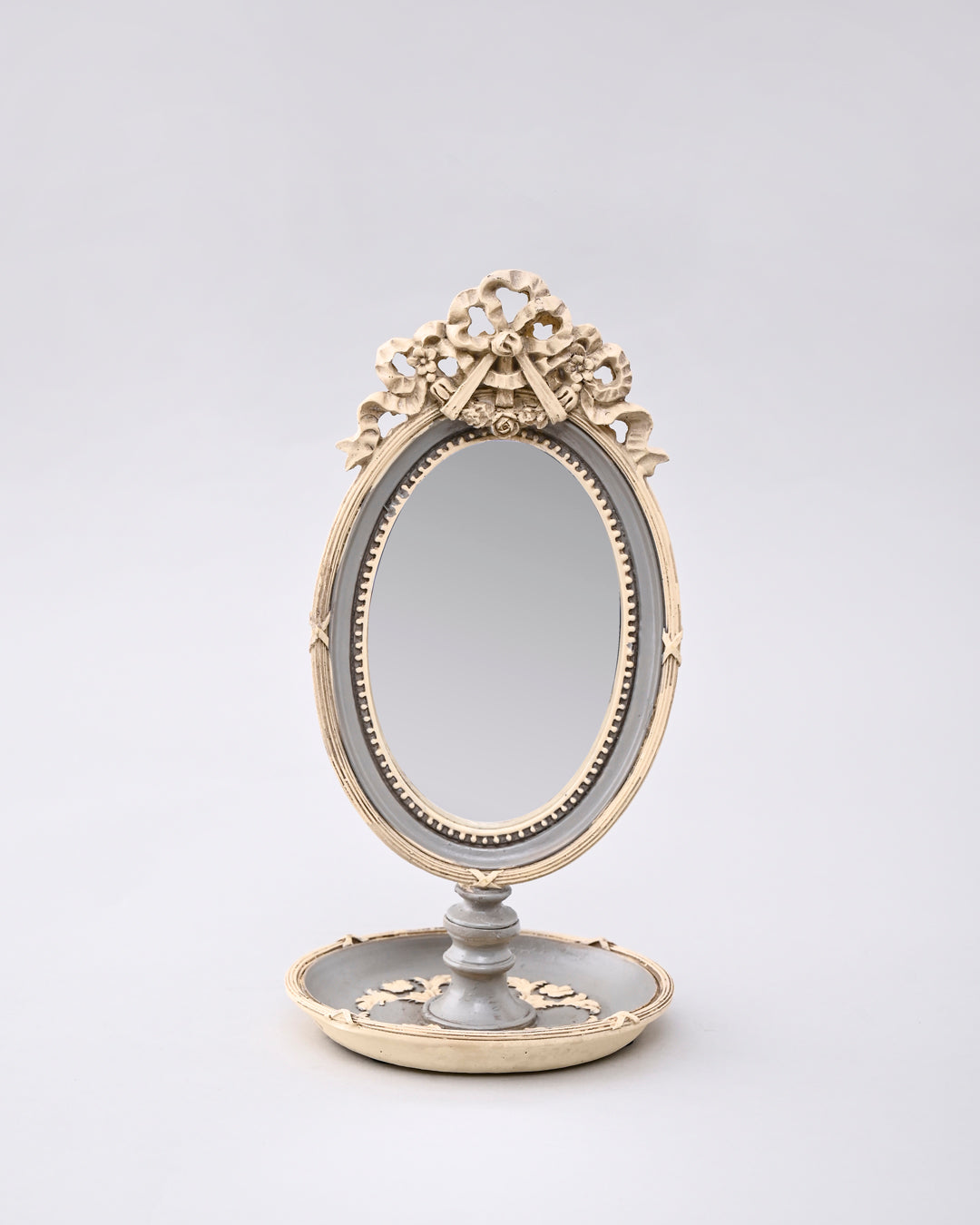 Vintage Bow-Topped Oval Vanity Mirror