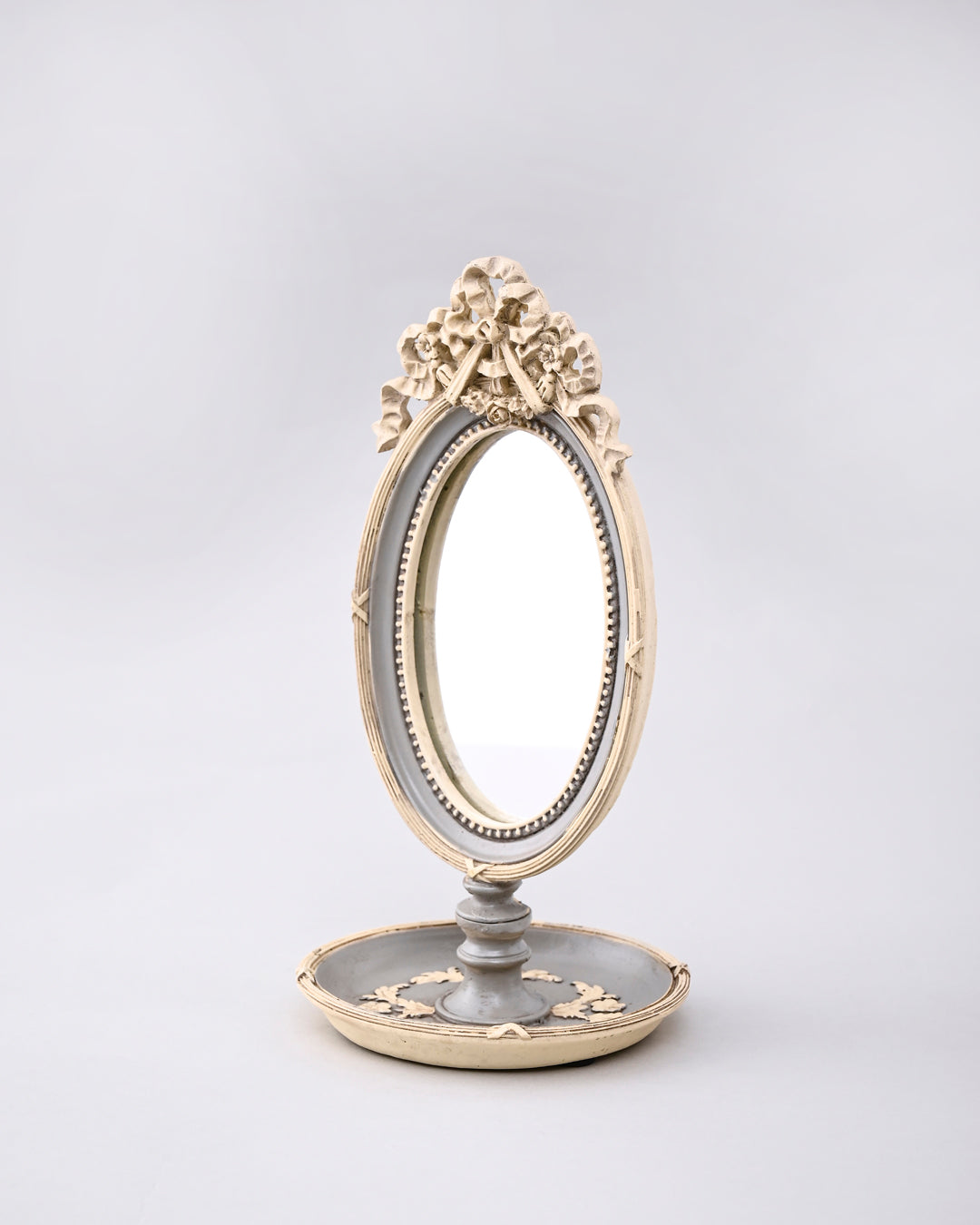 Vintage Bow-Topped Oval Vanity Mirror